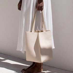 LÉMÉLS Leather Beige Mail Bag / Tote from WConcept